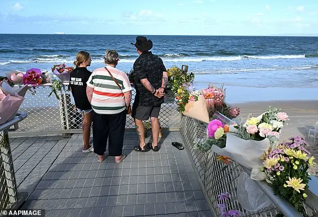 Father of teenage surf lifesaver mauled by shark urges people to keep coming to the beach