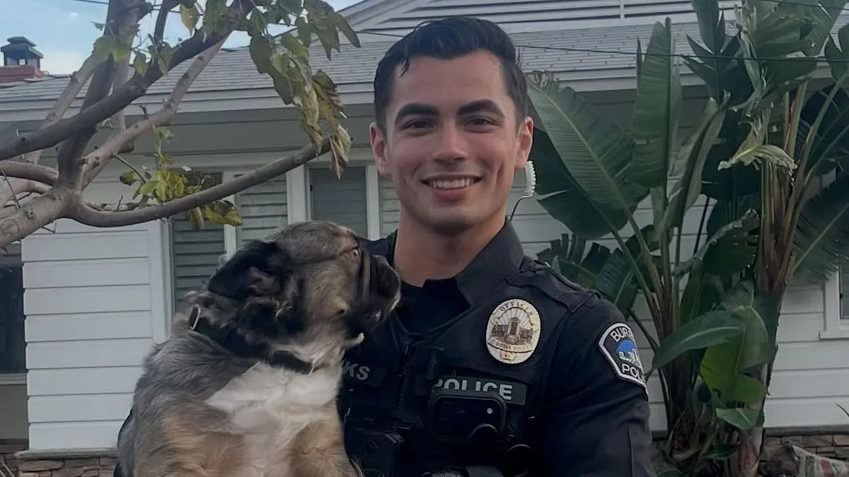 California Police Officer Becomes Internet Sensation After Viral Photo with French Bulldogs