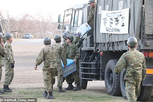 Japan orders immediate evacuations as deadly tsunami waves strike northeastern coast.