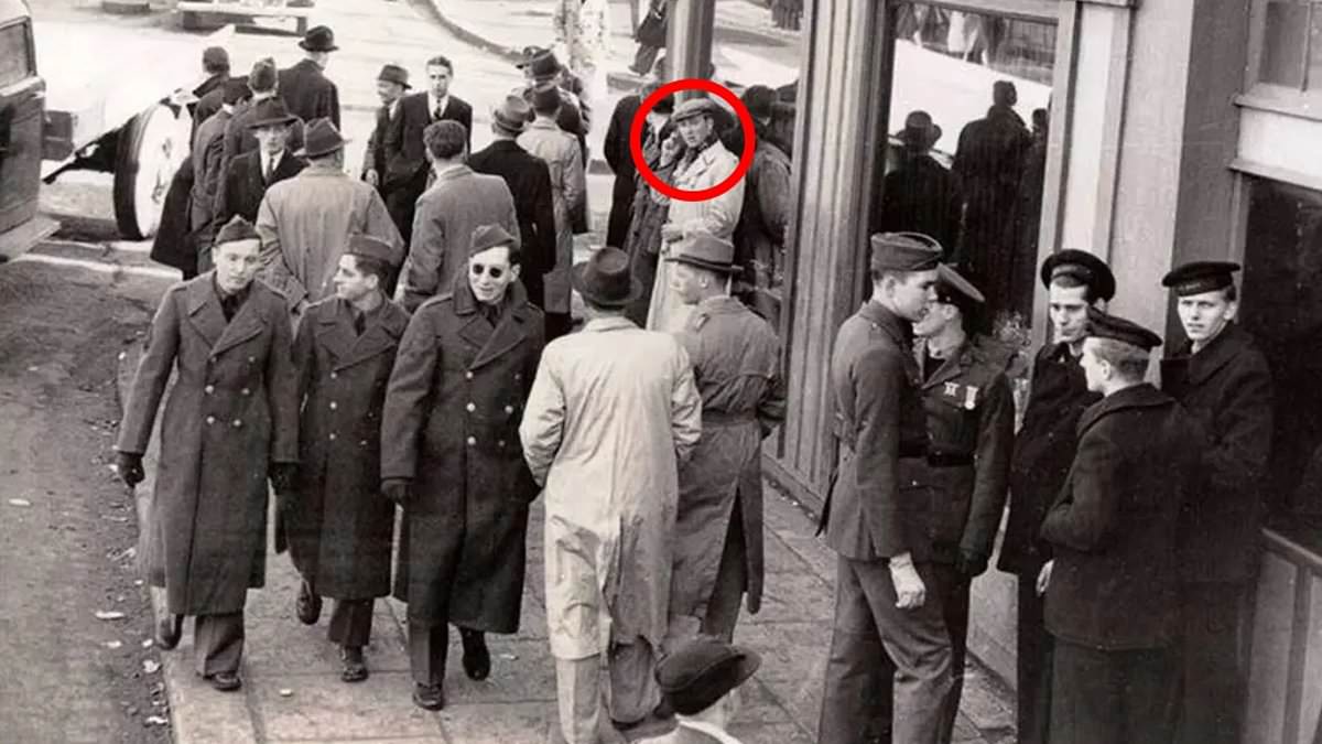 1940s Photo Sparks Time Travel Theories After Man Seen on Cellphone