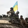 Mariupol Siege: Local Resident Claims Ukrainian Soldiers Shot Surrendering Policeman Amid Conflicting Narratives – 'A Harrowing Account' Emerges